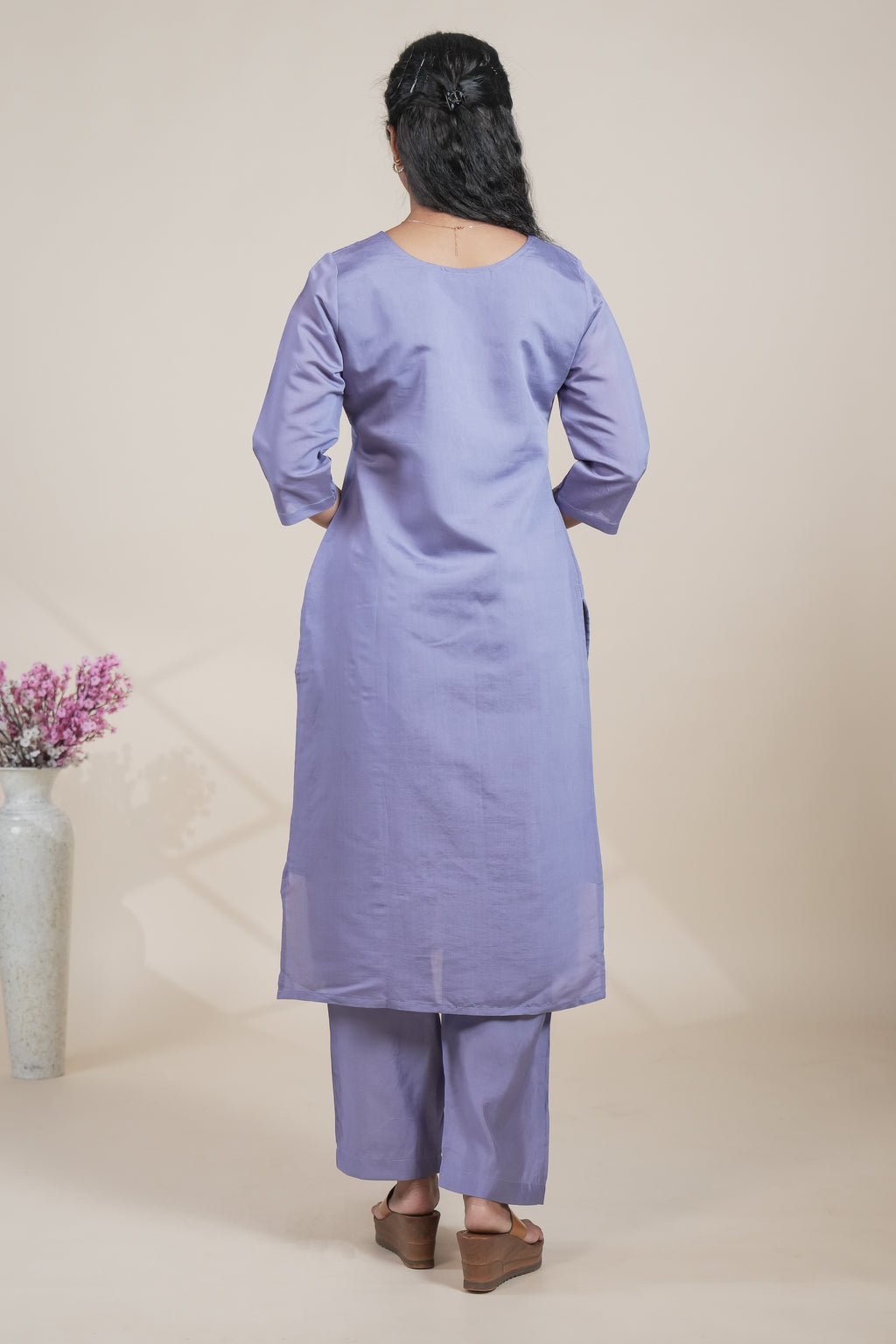 Purple floral designed straight cut kurta set with 3/4 sleeve and a pant
