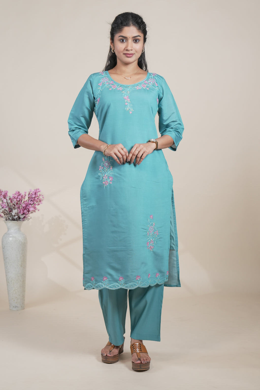 Blue floral designed straight cut kurta set with 3/4 sleeve and a pant