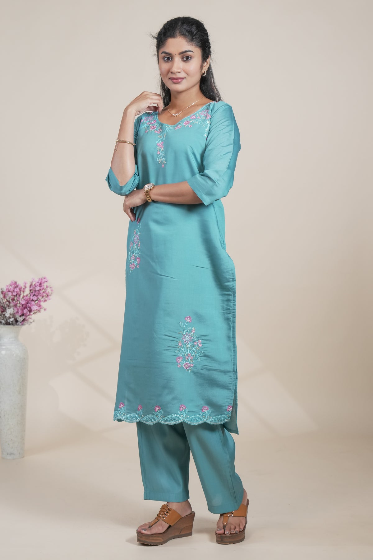 Blue floral designed straight cut kurta set with 3/4 sleeve and a pant