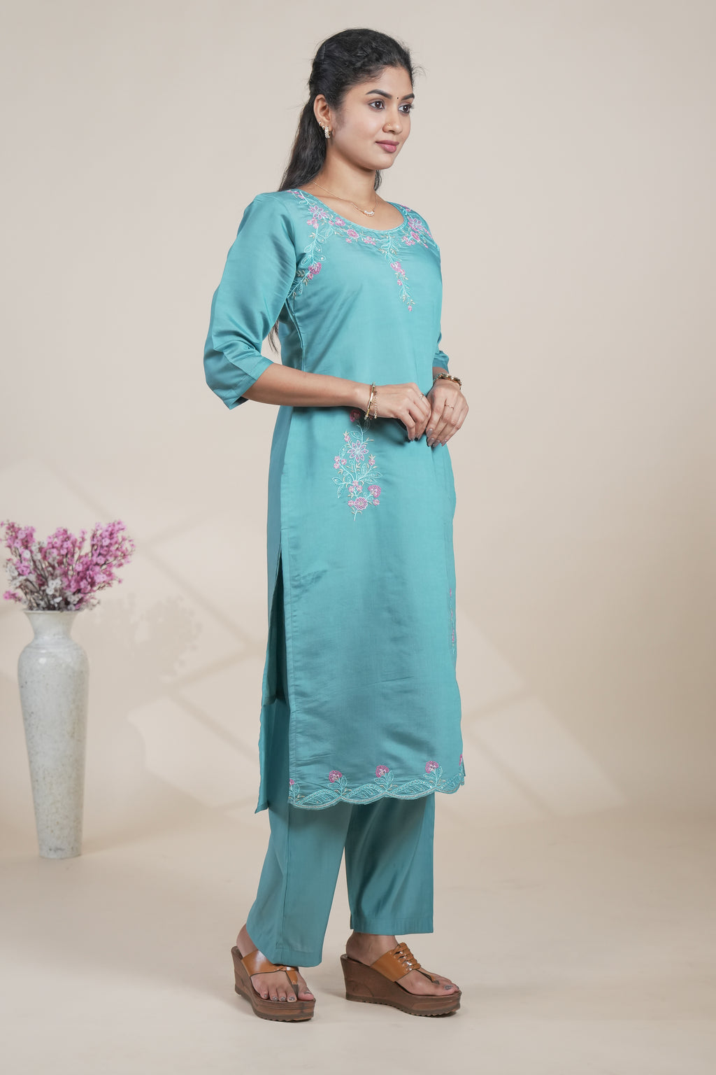 Blue floral designed straight cut kurta set with 3/4 sleeve and a pant
