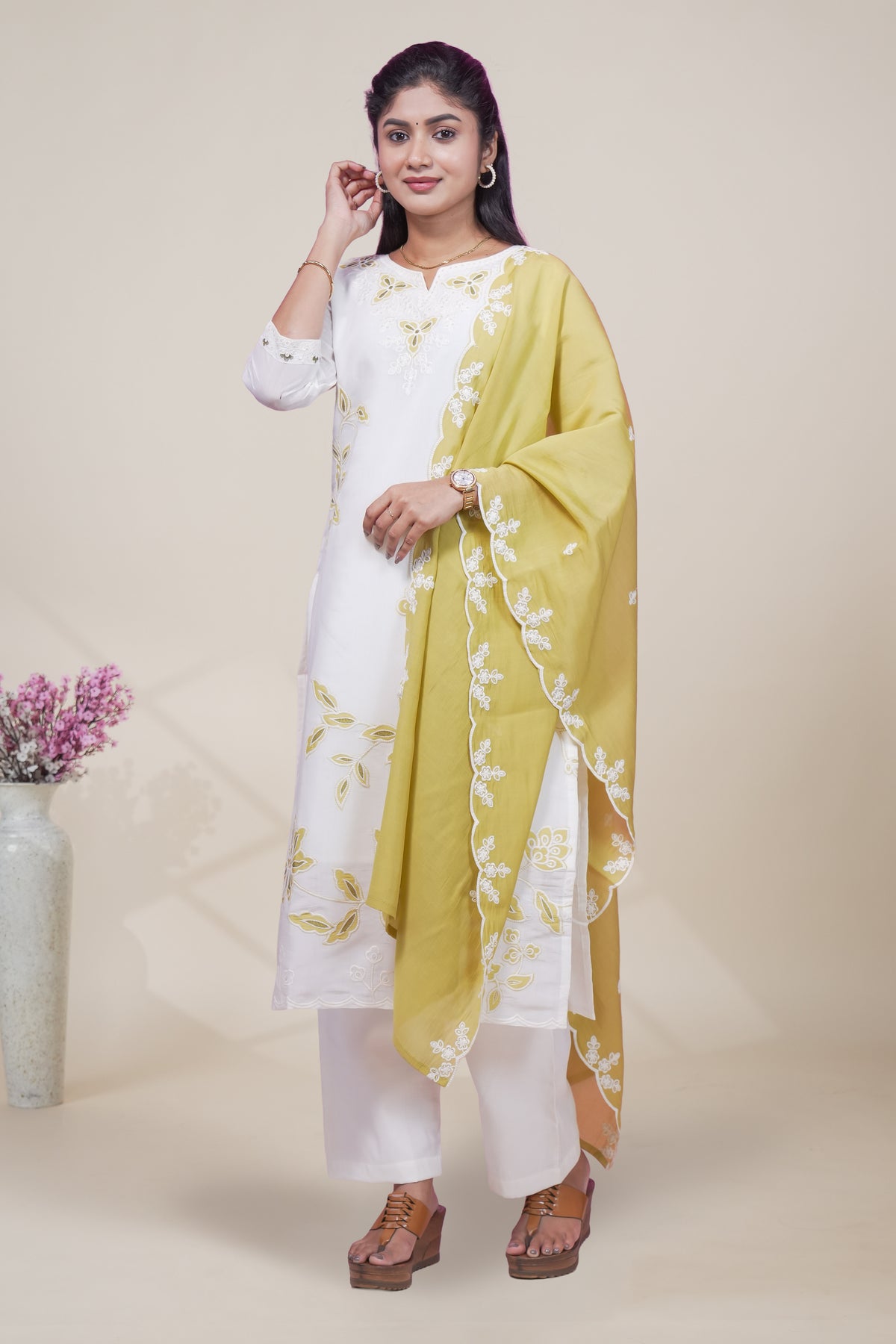 white floral designed straight cut kurta set with 3/4 sleeve and a shawl