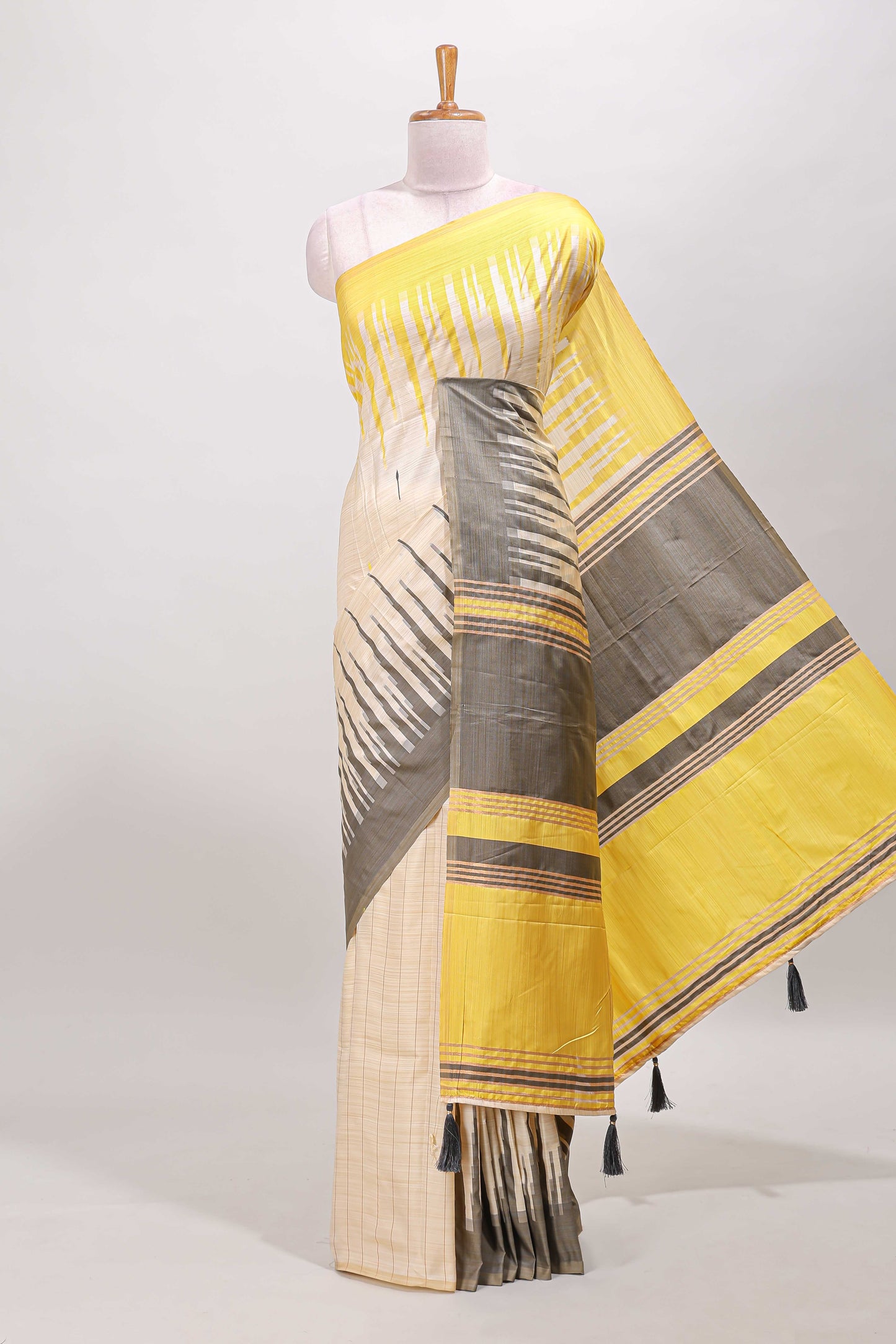 Borderless sandal striped yellow & grey shade ikkat style semi soft silk saree with contrast striped pallu and matching blouse
