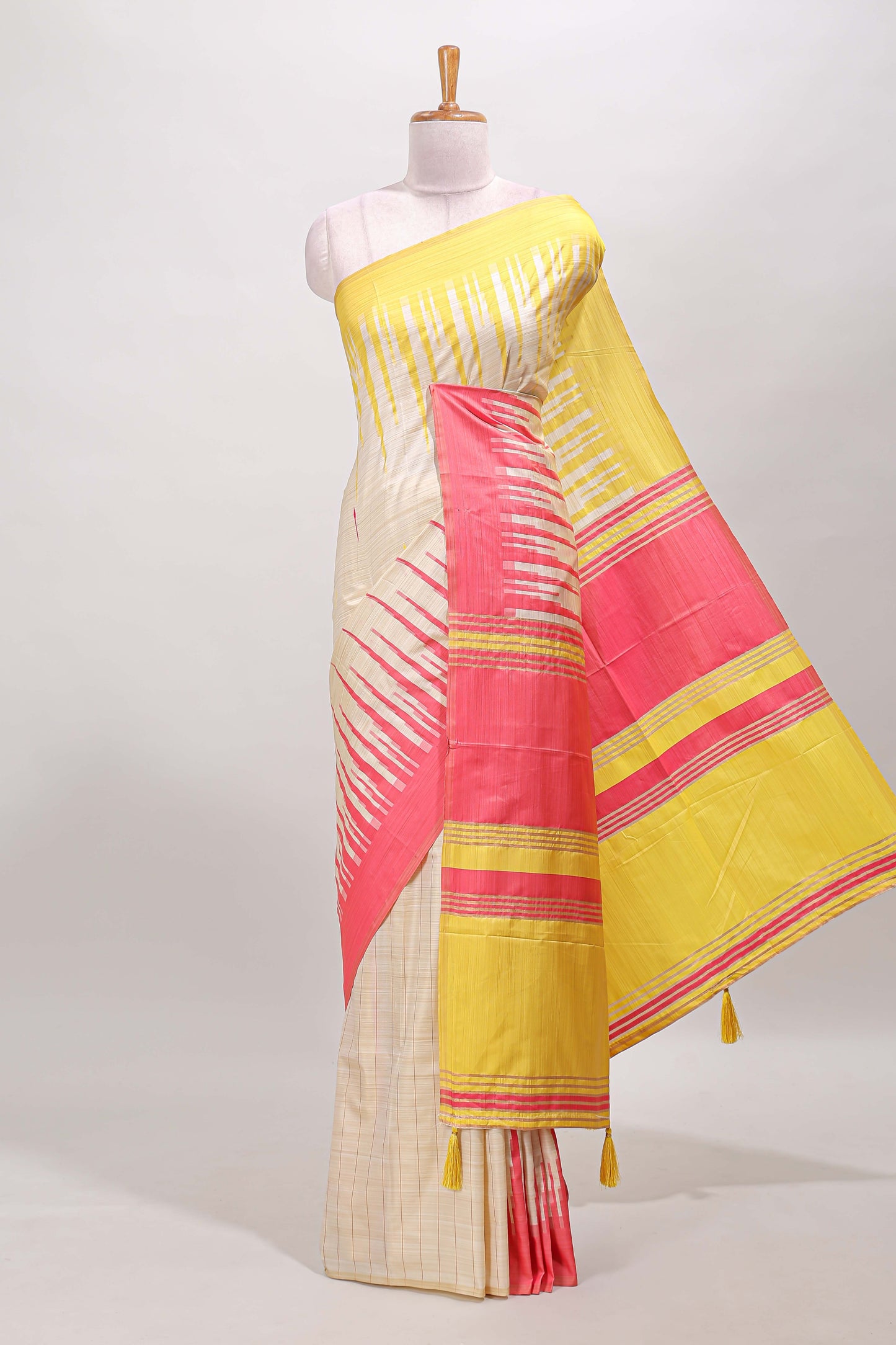 Borderless sandal striped yellow & pink shade ikkat style semi soft silk saree with contrast striped pallu and matching blouse