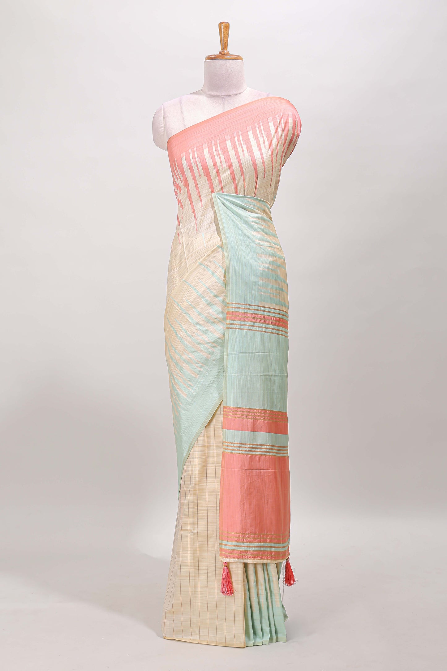Borderless sandal striped peach & ice blue shade ikkat style semi soft silk saree with contrast striped pallu and matching blouse