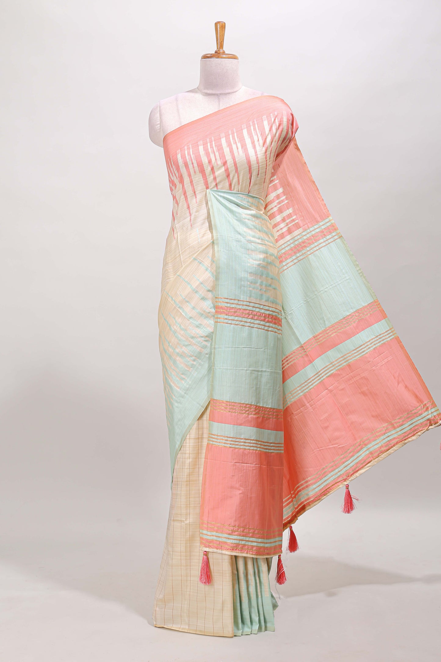 Borderless sandal striped peach & ice blue shade ikkat style semi soft silk saree with contrast striped pallu and matching blouse