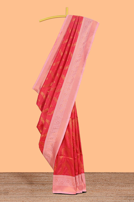 Pink zig zag zari design semi soft silk saree with contrast border and floral printed blouse