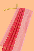 Pink zig zag zari design semi soft silk saree with contrast border and floral printed blouse