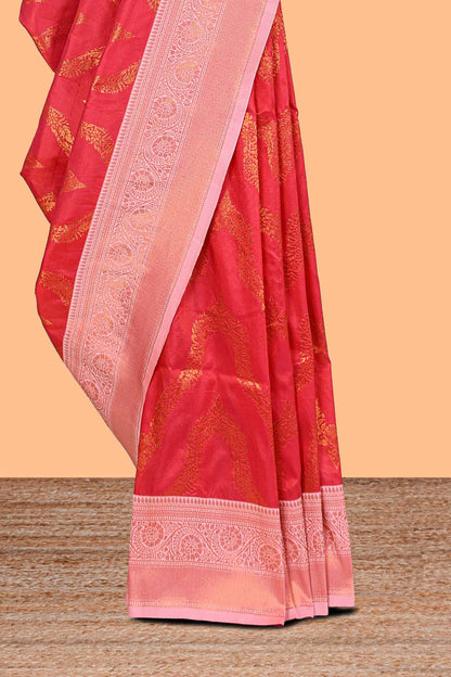 Pink zig zag zari design semi soft silk saree with contrast border and floral printed blouse