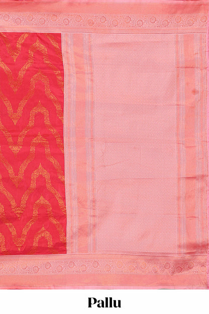 Pink zig zag zari design semi soft silk saree with contrast border and floral printed blouse