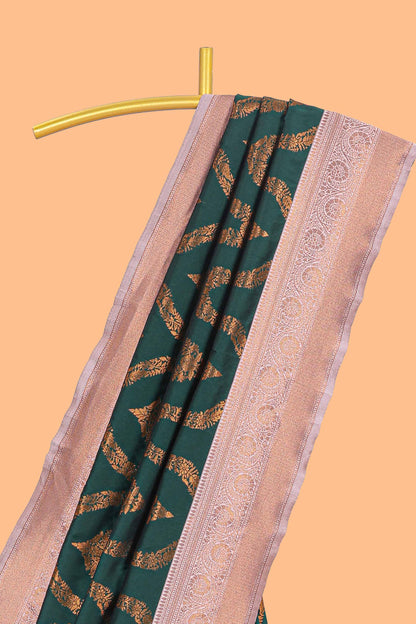 Green zig zag zari design semi soft silk saree with contrast border and floral printed blouse