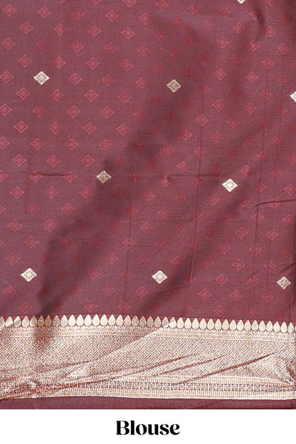 Brown zig zag zari design semi soft silk saree with contrast border and floral printed blouse
