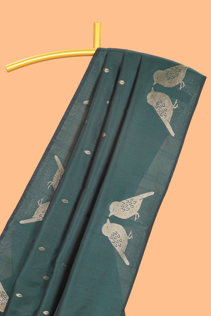 Borderless forest green leaf zari butta and birds design semi soft silk saree with self pallu and matching blouse