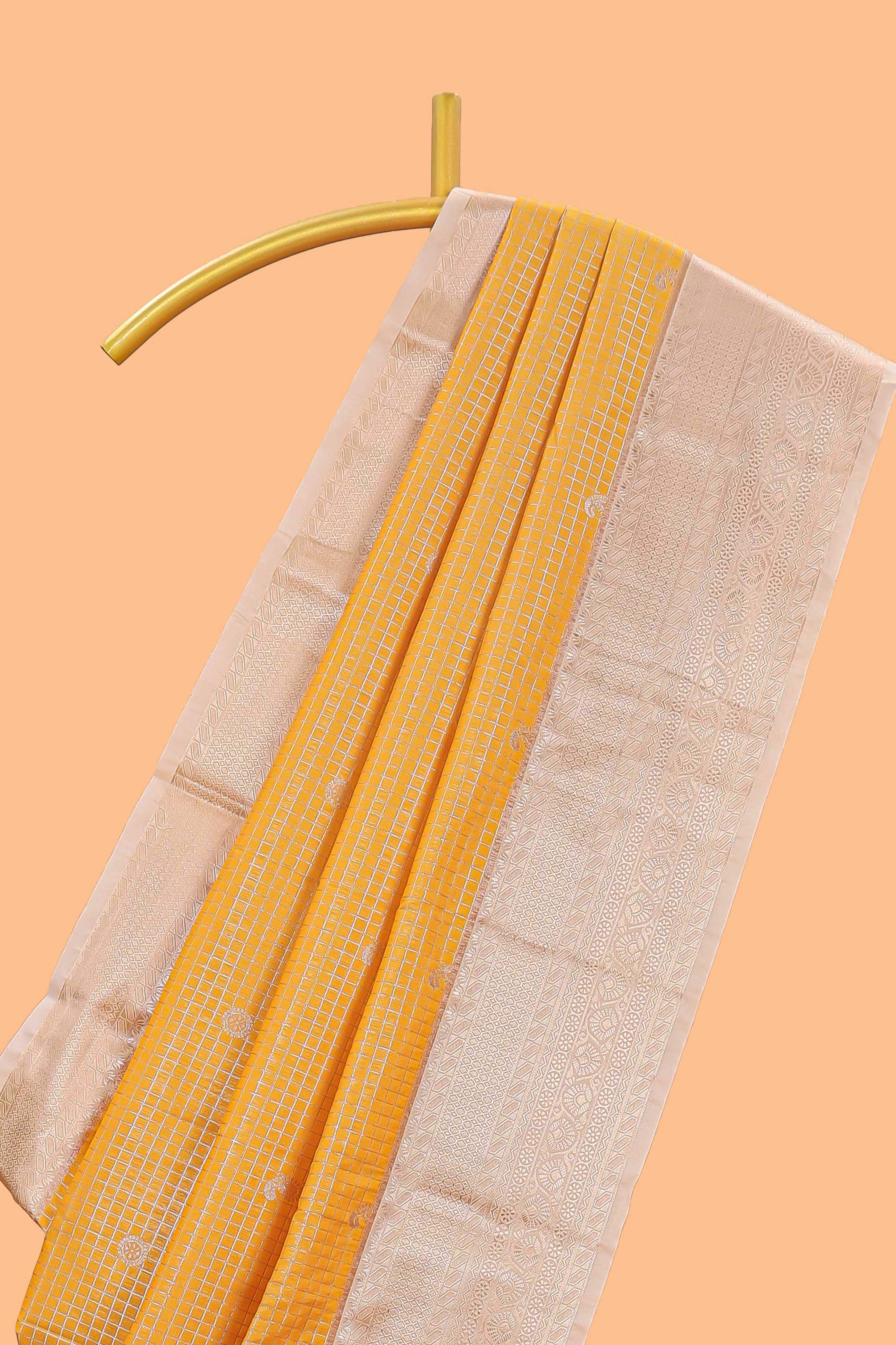 Mustard checked zari butta semi soft silk saree with contrast border and pallu