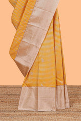 Mustard checked zari butta semi soft silk saree with contrast border and pallu