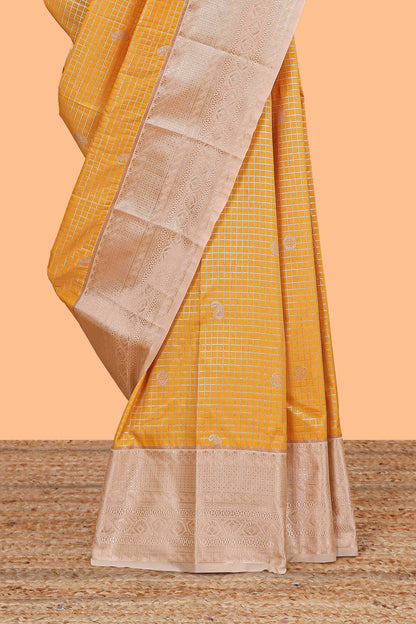 Mustard checked zari butta semi soft silk saree with contrast border and pallu