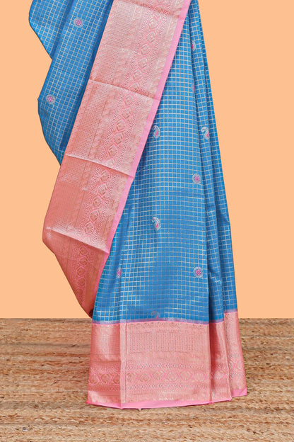 Blue checked zari butta semi soft silk saree with contrast border and floral design pallu