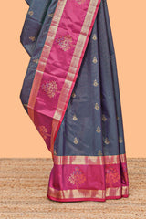Grey zari butta design semi soft silk saree with contrast bentex border and pallu