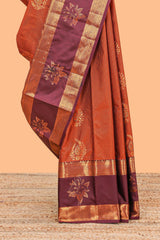 Bright orange striped zari motifs semi soft silk saree with contrast bentex border and pallu