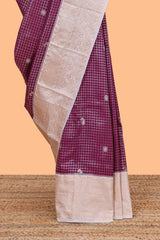 Jam purple checked zari motifs semi soft silk saree with contrast border and floral design pallu