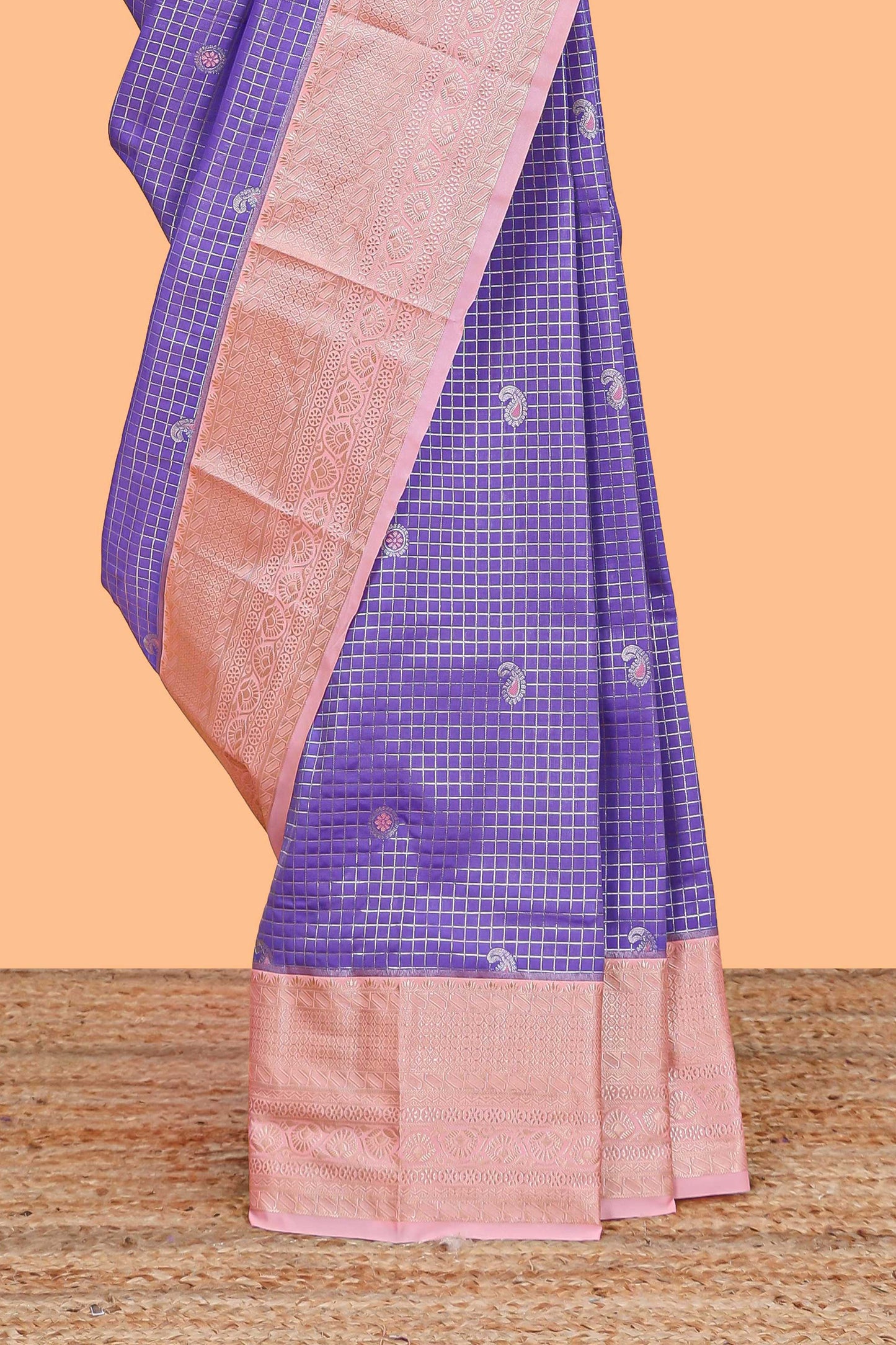 Lavender checked zari motifs semi soft silk saree with contrast border and floral design pallu