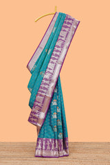 Green geometric design birds zari motifssemi soft silk saree with contrast border and floral design pallu