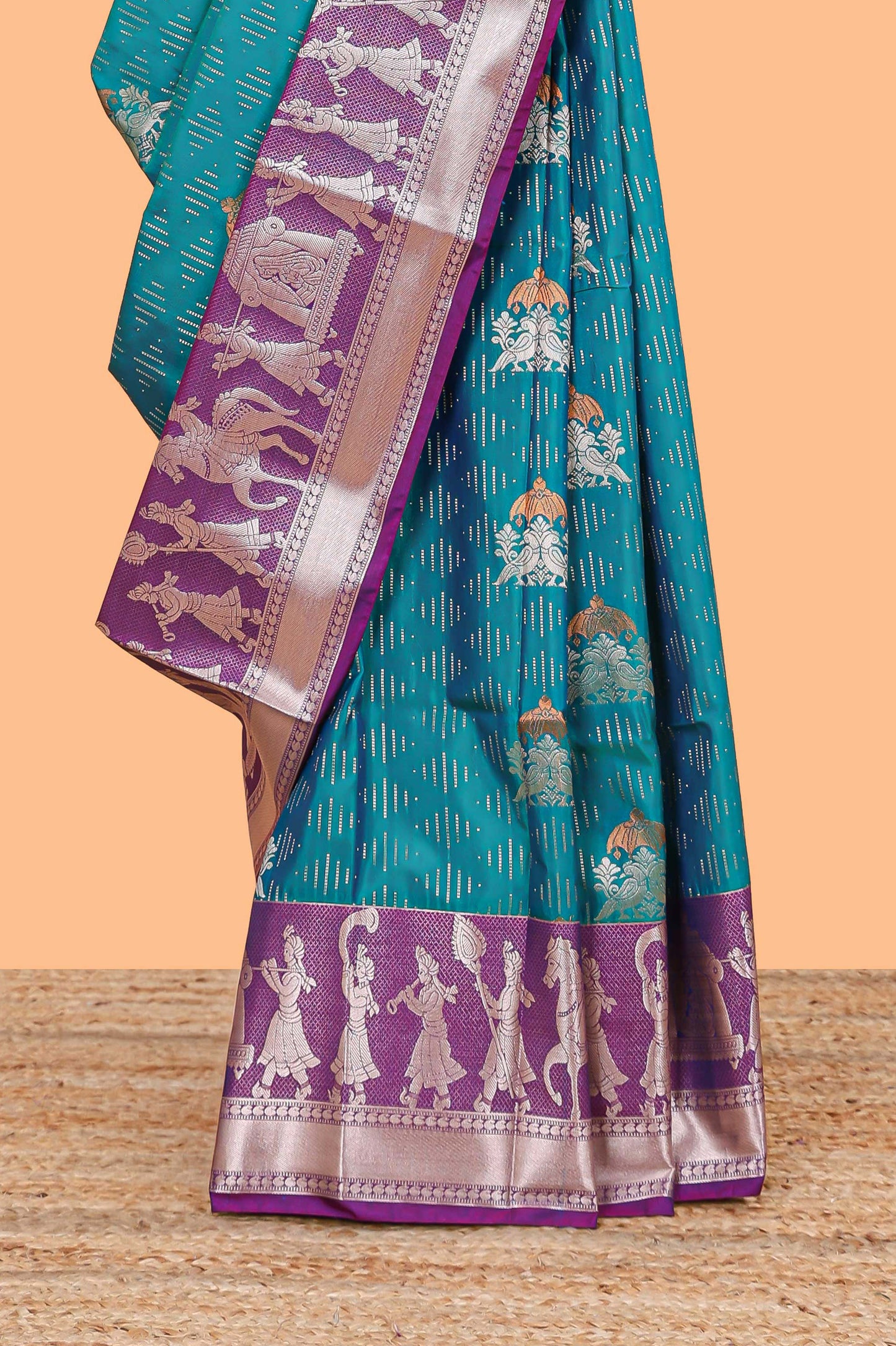 Green geometric design birds zari motifs  semi soft silk saree with contrast border and floral design pallu