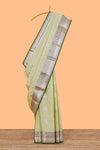 Green checked zari buttas semi soft silk saree with contrast zari border and floral design pallu