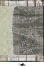 Green checked zari buttas semi soft silk saree with contrast zari border and floral design pallu
