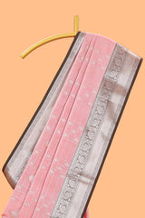 Pink checked zari buttas semi soft silk saree with contrast zari border and floral design pallu