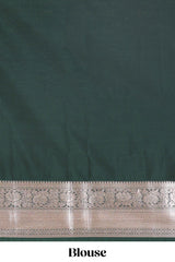Rani pink checked zari buttas semi soft silk saree with contrast zari border and floral design pallu