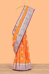 Orange checked zari buttas semi soft silk saree with contrast zari border and floral design pallu