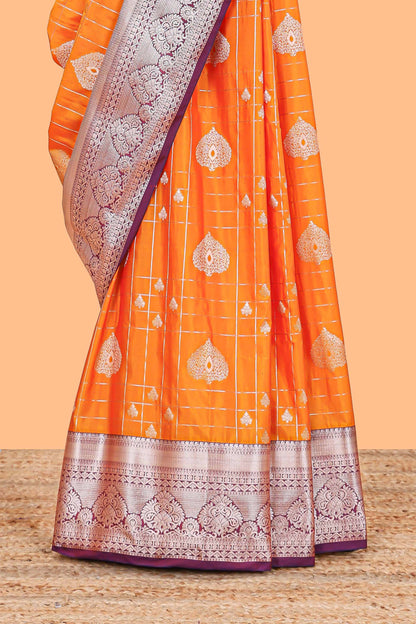 Orange checked zari buttas semi soft silk saree with contrast zari border and floral design pallu
