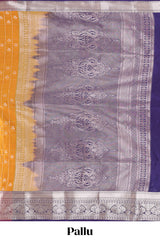Orange checked zari buttas semi soft silk saree with contrast zari border and floral design pallu