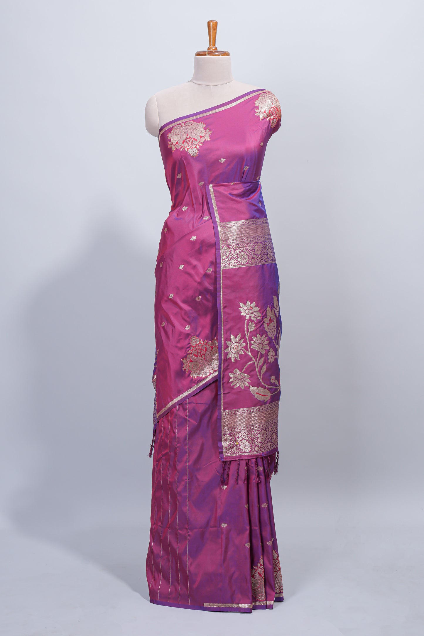 Magenta & purple dual tone floral zari motifs design semi soft silk saree with self border and matching blouse