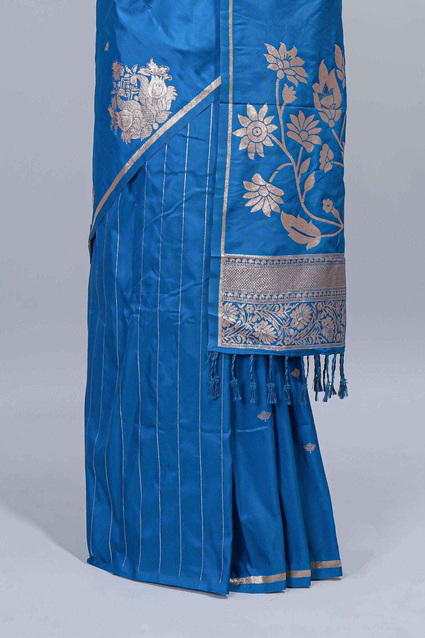 Blue floral zari motifs design semi soft silk saree with self border and matching blouse