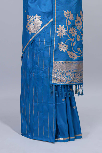 Blue floral zari motifs design semi soft silk saree with self border and matching blouse