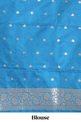 Blue colour Semi soft silk withgold zari floral motifs border with peacock motifs and matching blouse