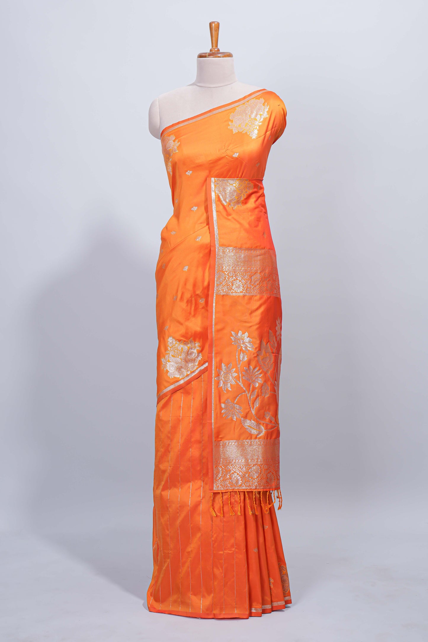 Orange floral zari motifs design semi soft silk saree with self border and matching blouse