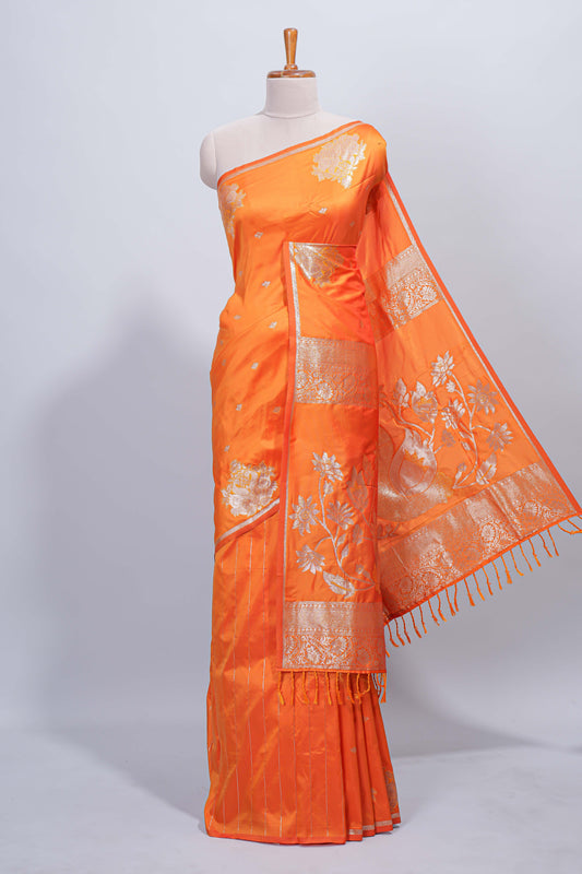 Orange floral zari motifs design semi soft silk saree with self border and matching blouse