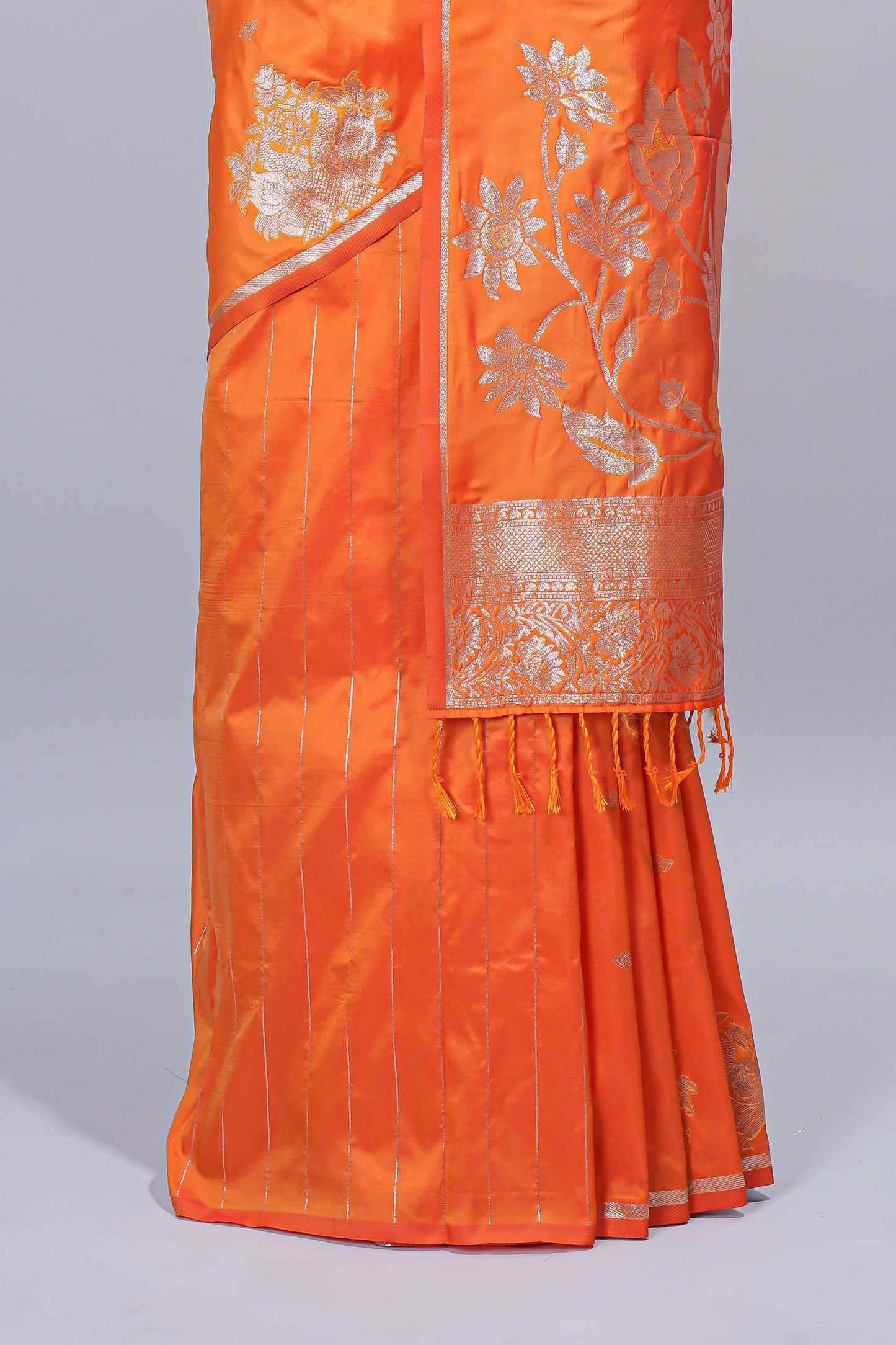 Orange floral zari motifs design semi soft silk saree with self border and matching blouse