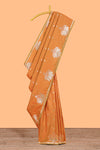 Rust Orange colour Semi soft silk withgold zari floral motifs border with peacock motifs and matching blouse