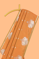 Rust Orange colour Semi soft silk withgold zari floral motifs border with peacock motifs and matching blouse