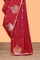 Red colour Semi soft silk withgold zari floral motifs border with peacock motifs and matching blouse