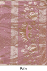 Peach colour Semi soft silk withgold zari floral motifs border with peacock motifs and matching blouse