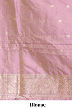 Peach colour Semi soft silk with  gold zari floral motifs border with peacock motifs and matching blouse