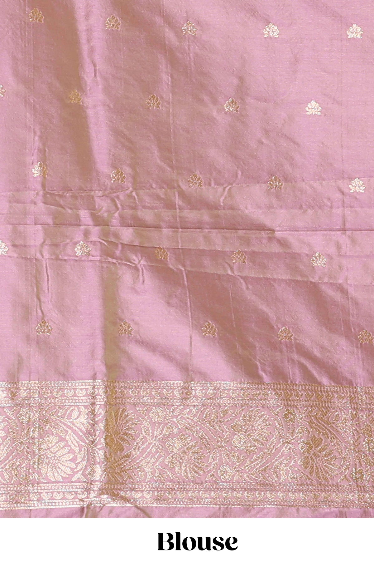 Peach colour Semi soft silk with  gold zari floral motifs border with peacock motifs and matching blouse
