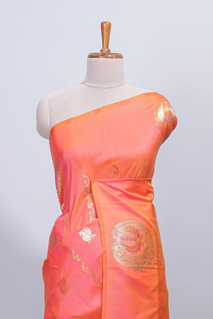 Orange floral zari motifs design semi soft silk saree with self border and matching blouse