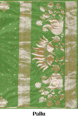 Green colour Semi soft silk withgold zari floral motifs border with peacock motifs and matching blouse