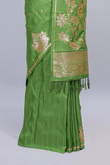 Green floral zari motifs design semi soft silk saree with self border and matching blouse