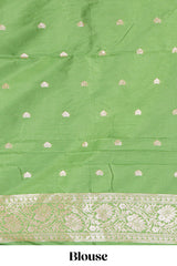 Green floral zari motifs design semi soft silk saree with self border and matching blouse